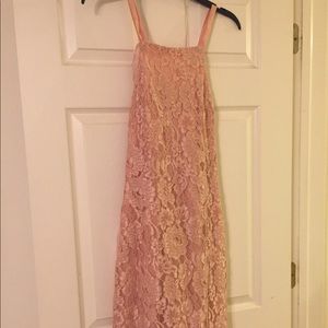 Satin strap peach lace dress.